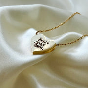 Cuore con incisione calligrafia